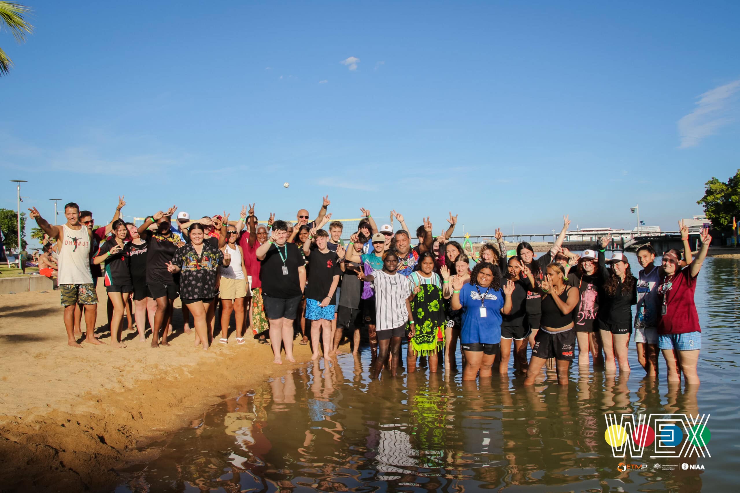 WEX Regional 2024 students standing together at the water’s edge